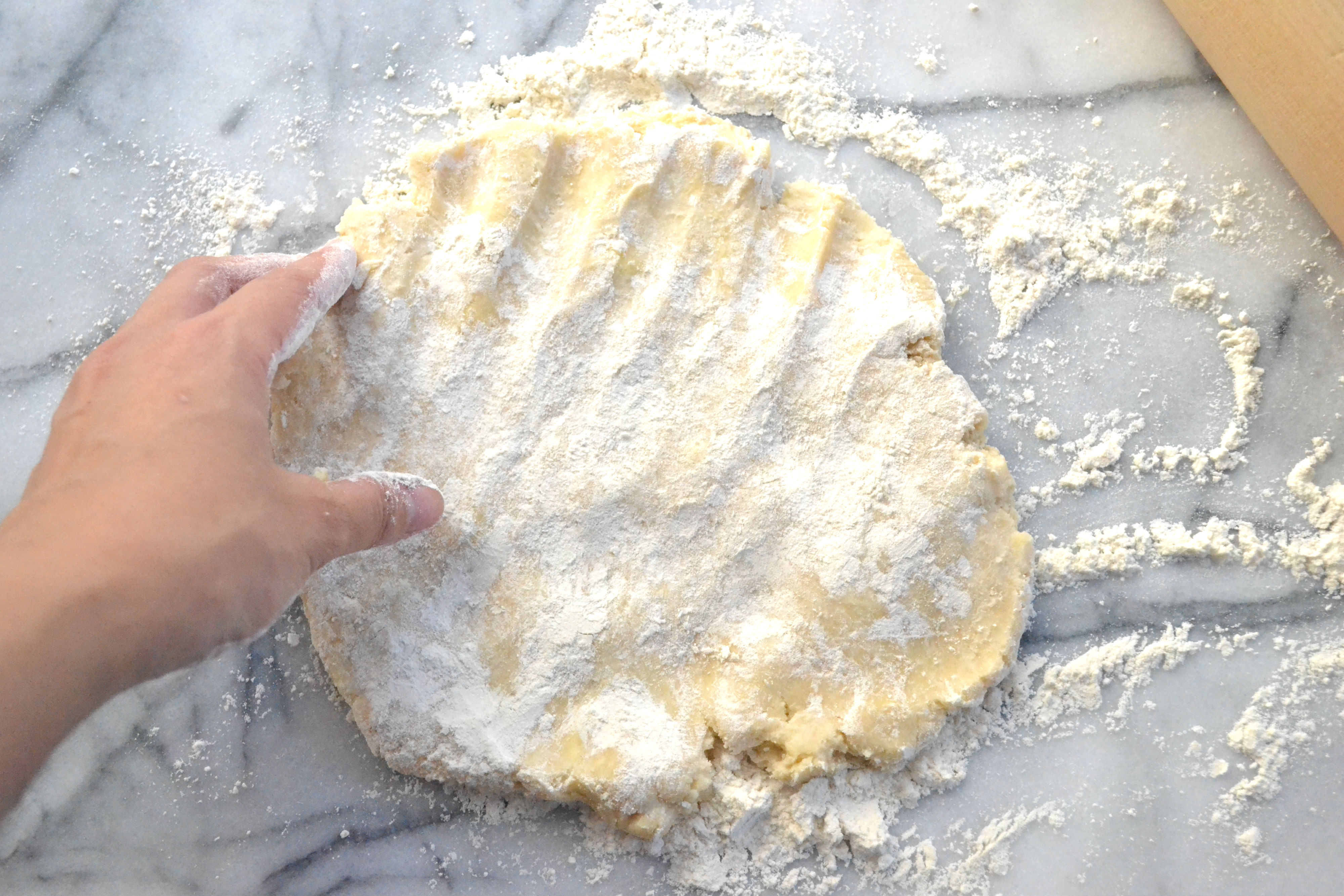 Work the flour into the dough (it will be very sticky).